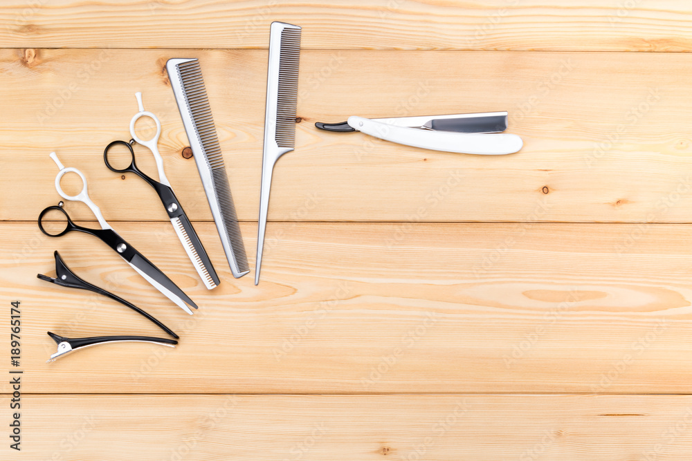 tools for creating beautiful hair, on a wooden background tools for creating beautiful hair, on a wooden background