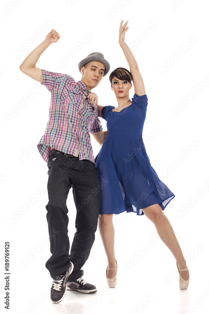 Couple of two dancers, woman on pointes, man with hat holding close in dynamic dance figure, on white background Couple of two dancers, woman on pointes, man with hat holding close in dynamic dance figure, on white background