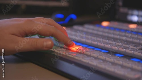 Person clicking on buttons to select camera
