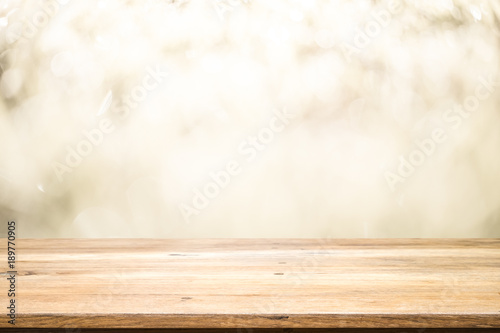 Wood table top on bokeh background