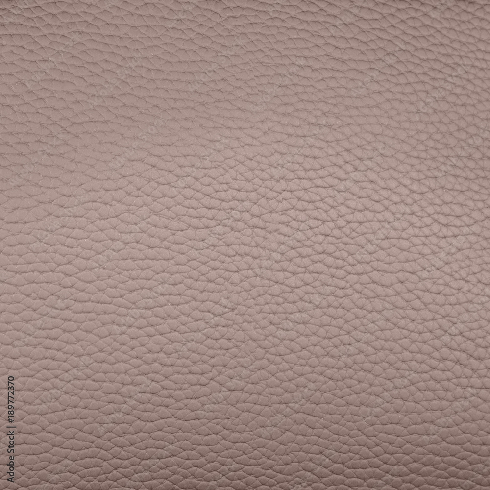 A piece of lilac artificial leather texture closeup A piece of lilac artificial leather texture closeup