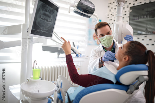 Dentist making x-ray to patient