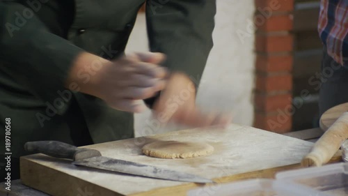 Chef is kneading tortilla dough