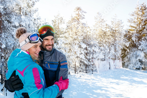 cheerful couple on winter holidays