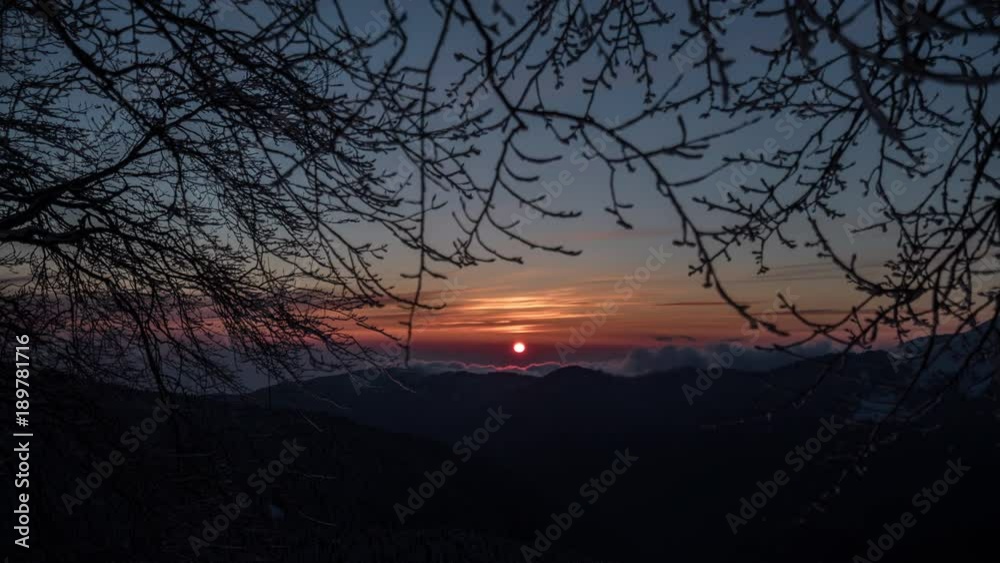 Dawn, sunrise time lapse of the amazing mountain with tree Dawn, sunrise time lapse of the amazing mountain with tree