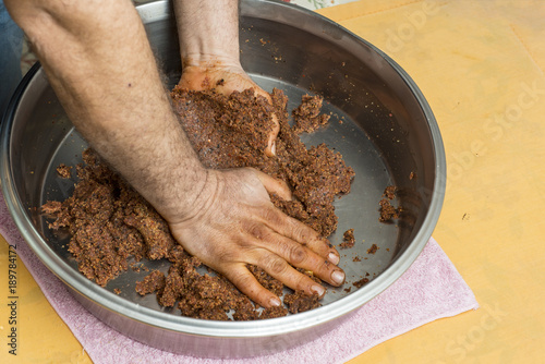 Man cooking in the kitchen, cig kofte