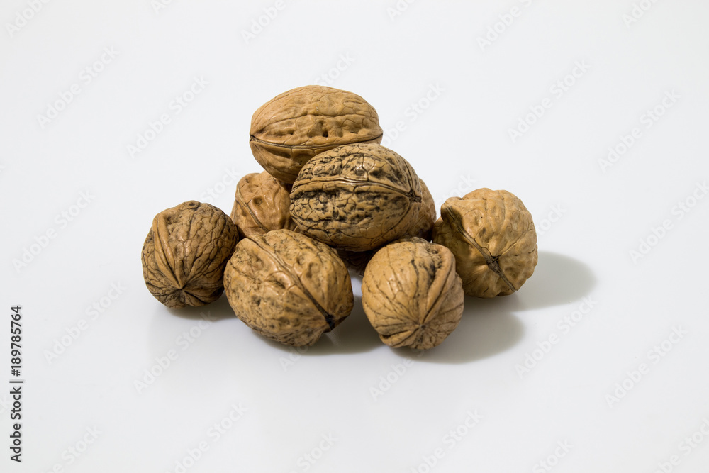 Walnuts composition in a white background Walnuts composition in a white background
