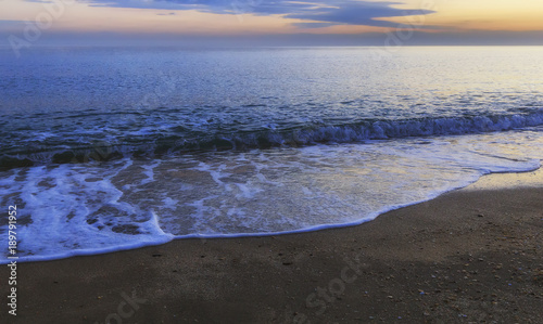 The coast of the Caspian Sea at sunset