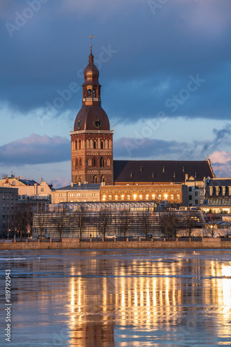 Riga embankment with the Dome Cathedral on the sunset