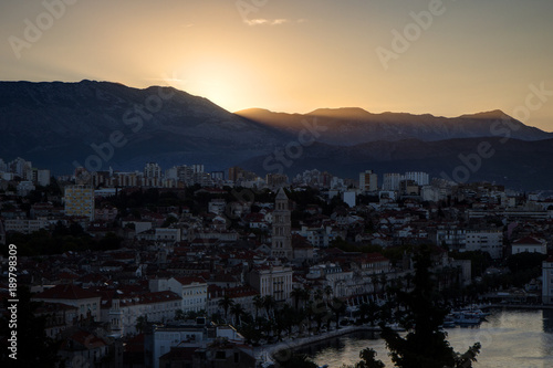 Scenic view of Split's historic Old Town and beyond from above in Croatia at sunrise. © tuomaslehtinen