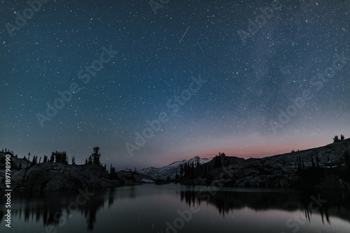 last milky way above mountain and lake