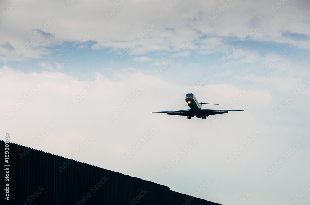 Airplane is approaching runway to land at airport