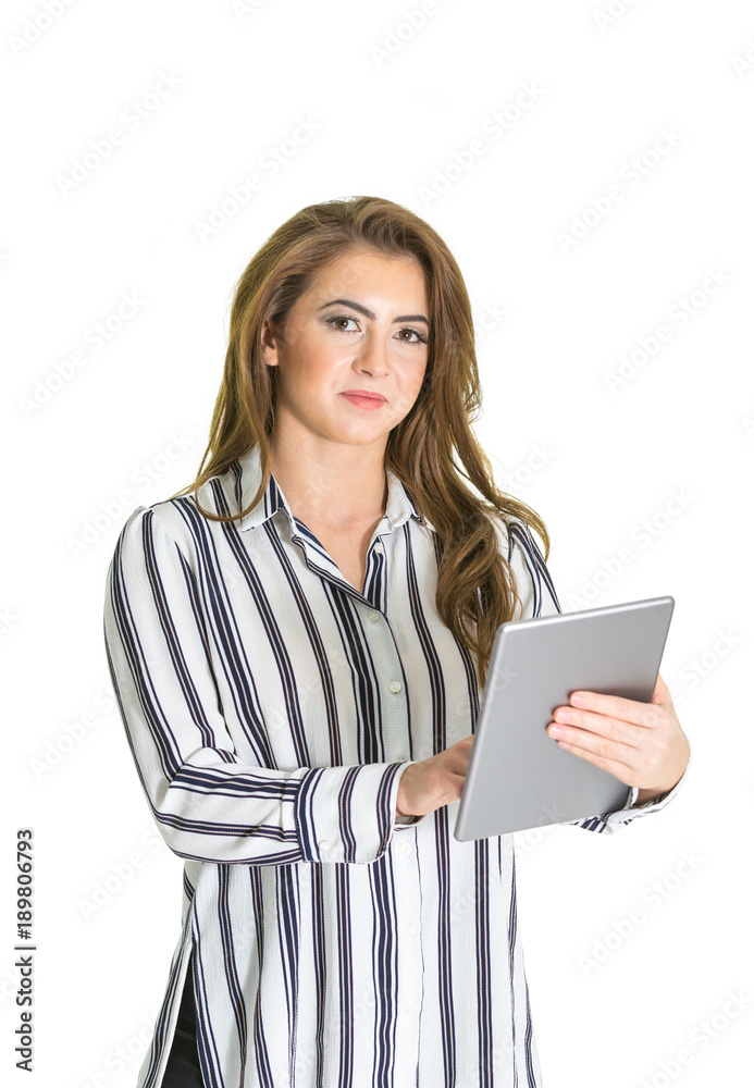 Smartly dressed young woman using a computer tablet, white background Smartly dressed young woman using a computer tablet, white background