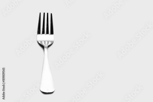 Fork background   A fork  in cutlery or kitchenware  is a tool consisting of a handle with several narrow tines on one end.