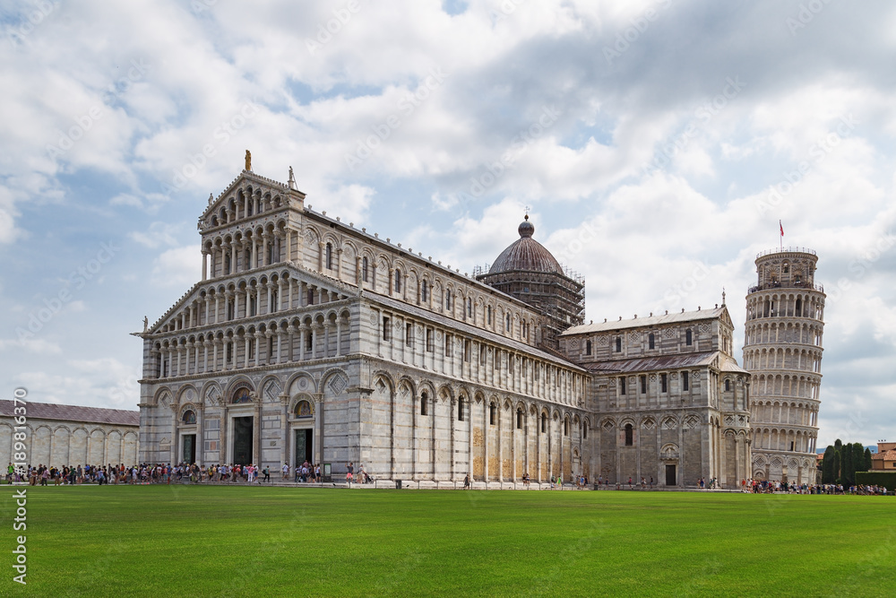 The Pisa Cathedral dedicated to the Assumption of  the Virgin Mary and Leaning Tower of Pisa. June 2017. The popular tourist attraction of Italy