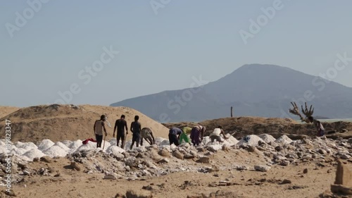 ETHIOPIA,LOMO-CIRCA  JANUARY 2018--unidentified people working in the salt industy