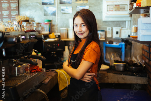 Portrait of a girl baristas,Female Owner Of Coffee Shop