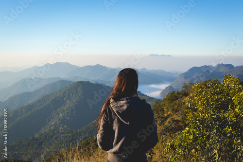 Woman standing on the mountain