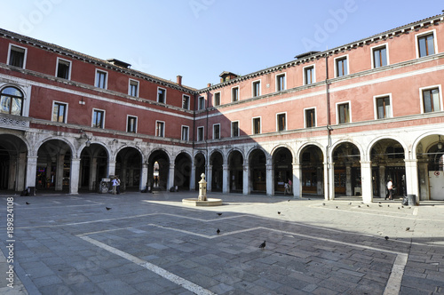 Fototapeta Naklejka Na Ścianę i Meble -  San Giacomo square and oldest bell tower in Venice Italy