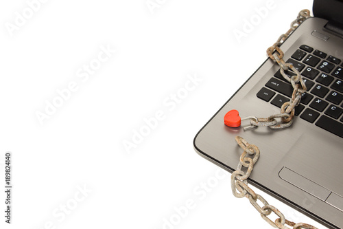 the laptop is in chains and a beautiful red closed lock. Limited access to data. Adult site