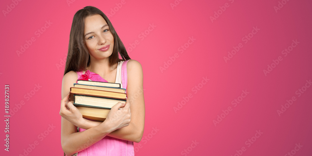 student with books in hands student with books in hands