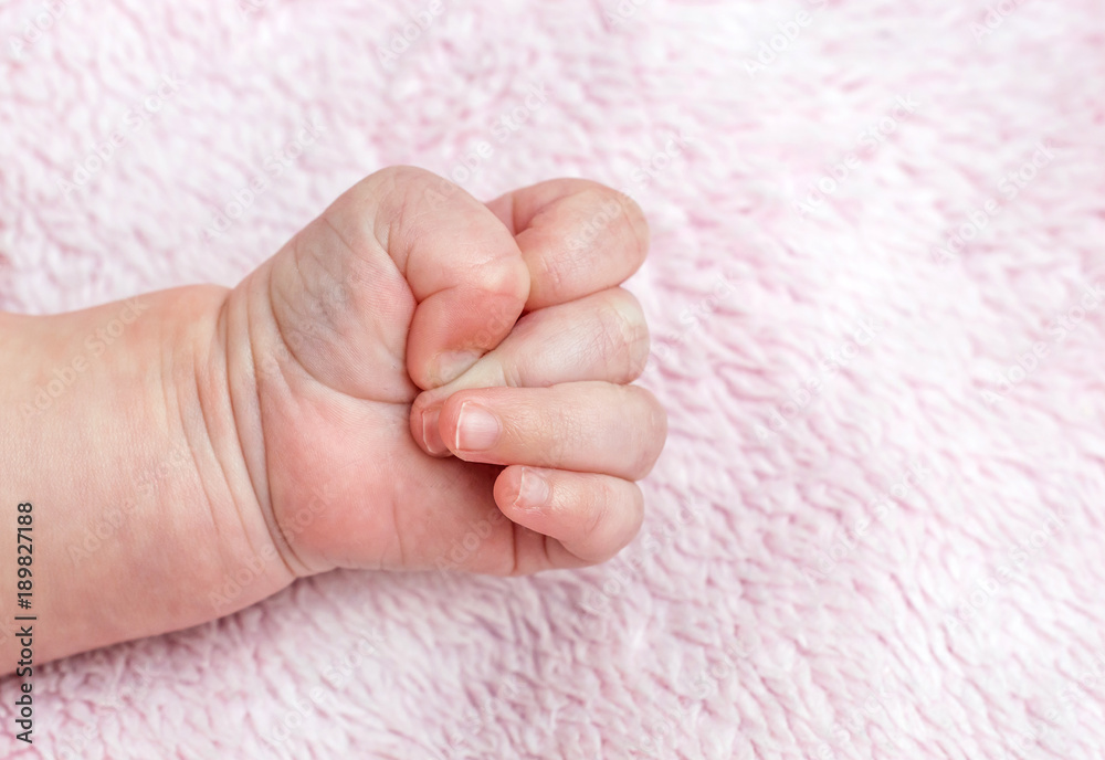 Babies hand. Close up.