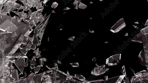 Pieces of shattered glass isolated on black