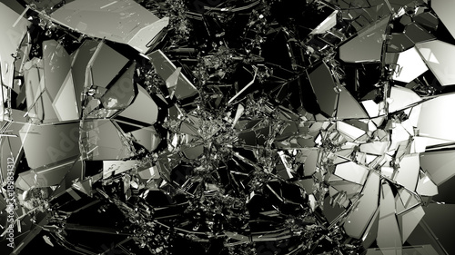 Pieces of splitted or cracked glass on black