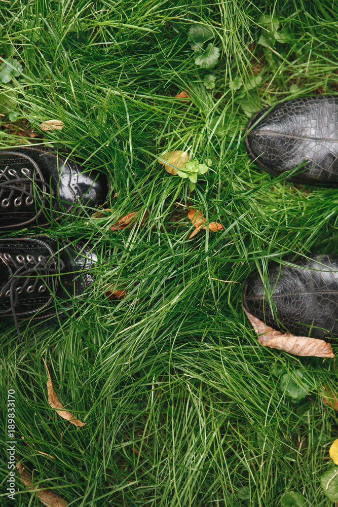 Autumn concept. Shoes on the autumn grass. Autumn concept. Shoes on the autumn grass.