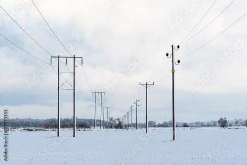 Power lines in a snowy landscape