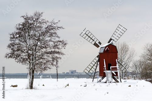 Old windmill in a winter scenery