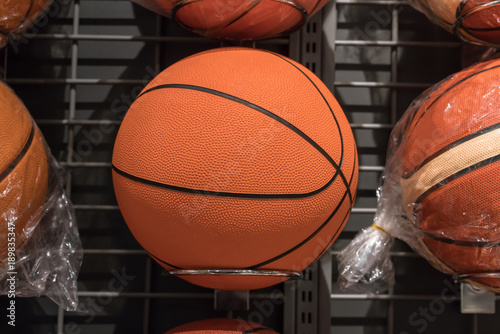 Basketballs on the rack of sports retail store