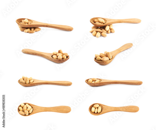 Spoon full of peanuts isolated