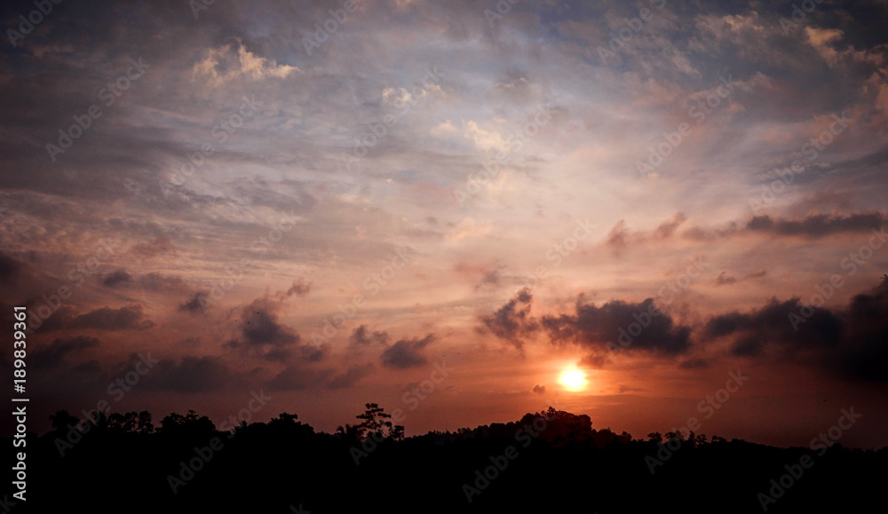 Beautiful sunset over trees on Sri Lanka