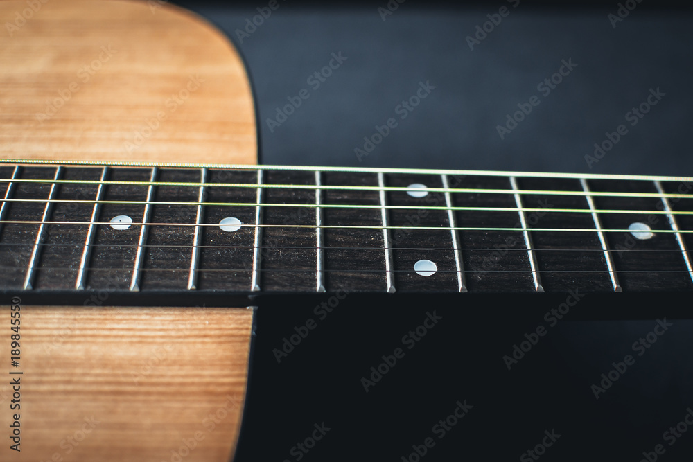 Fototapeta premium closeup shot of guitar and strings with shallow depth of field.soft focus.