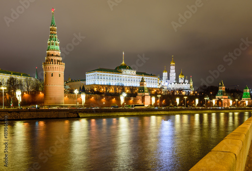 Illuminated Moscow Kremlin and Moscow river in winter evening, Russia