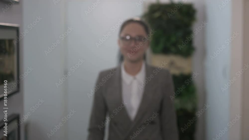 Young Businesswoman Walking Close to the Camera Young Businesswoman Walking Close to the Camera