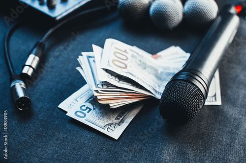 Music equipment, microphones, console and the money to pay the fee photo