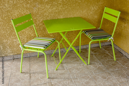 chairs and small apple green table