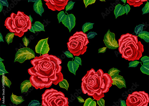 Embroidery ethnic pattern with red roses. Vector embroidered floral design for fashion wearing. © lxby60