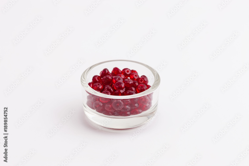 bowl full of garnet rondelles for creating jewelry bowl full of garnet rondelles for creating jewelry