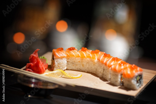 Japanese food. Appetizing sushi on a wooden board.