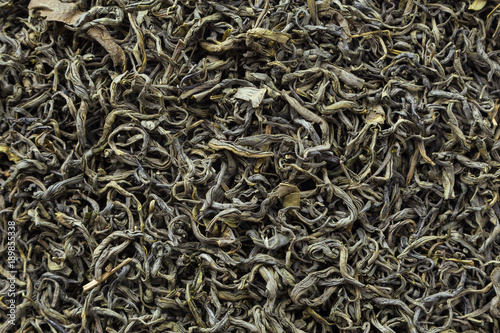 Tea herbs texture. Green tea background. Organic dried green tea leaves.