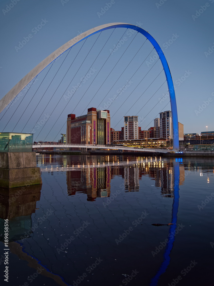 Fototapeta premium GATESHEAD, TYNE AND WEAR/UK - JANUARY 20 : View of the Millennium Bridge at dusk in Gateshead, Tyne and Wear on January 20, 2018