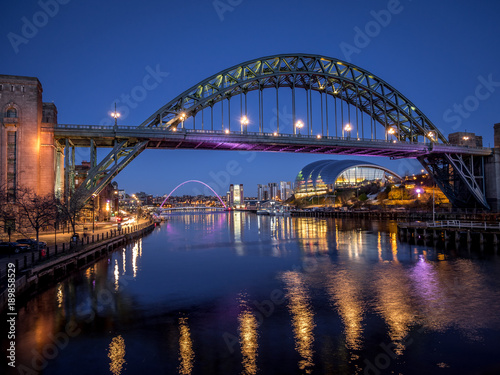 NEWCASTLE UPON TYNE, TYNE AND WEAR/UK - JANUARY 20 : View of the Tyne and Millennium Bridges at dusk in Newcastle upon Tyne, Tyne and Wear on January 20, 2018 © philipbird123