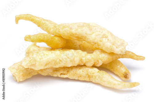 pile of dried fish maw on white background photo