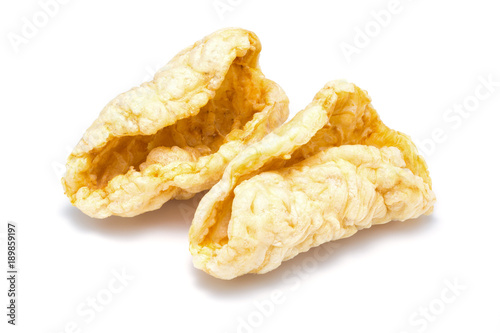 pile of dried fish maw on white background photo