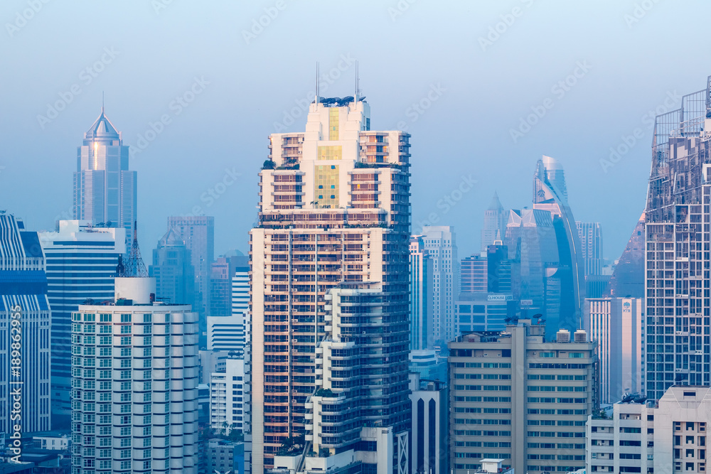 Fototapeta premium 27 January, 2018: top view crowd landscape city in Asoke Bangkok, Thailand with blue morning image