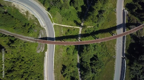 Beautiful scenery at Zbojská in middle Slovakia between Pohronská Polhora and Tisovec. Flying above an old, but functional railroad track parallel to the road. photo