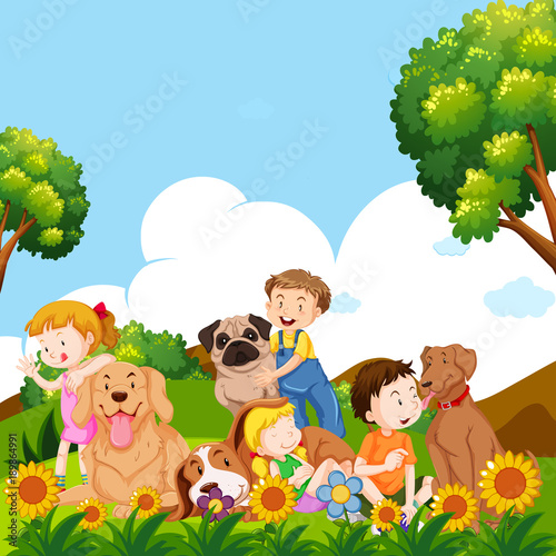 Children and pet dogs in garden